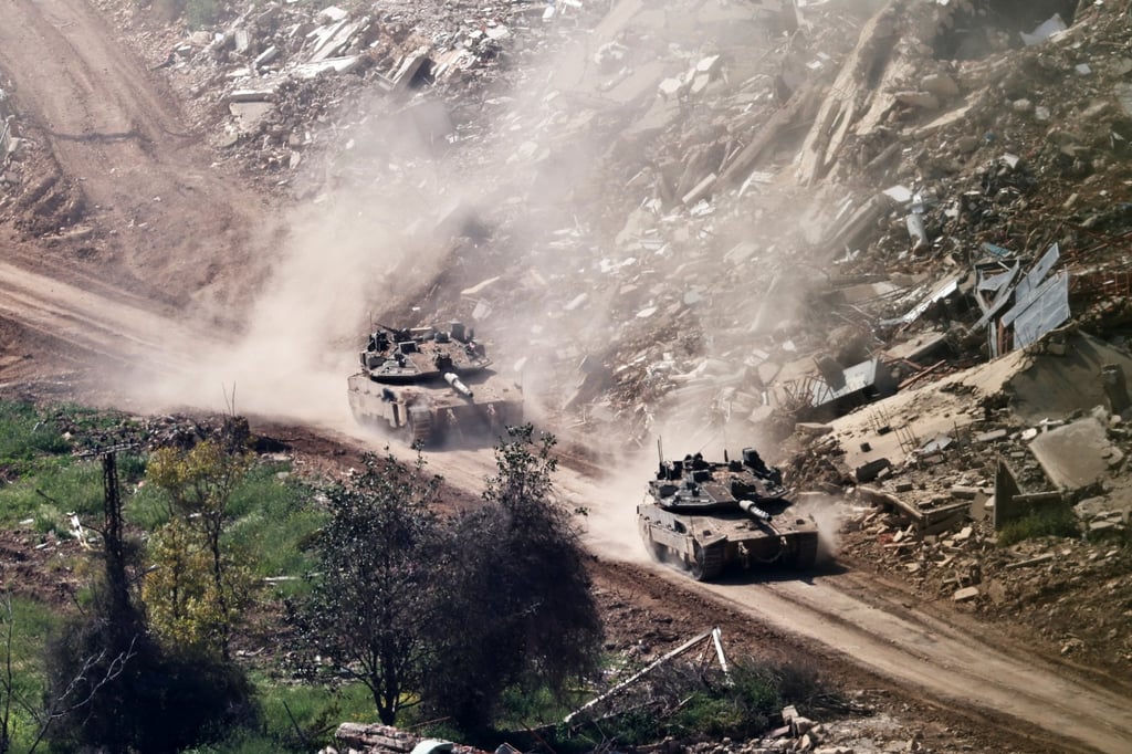 Israeli troops manoeuvre on the Lebanese side of the border on Saturday. Photo: EPA