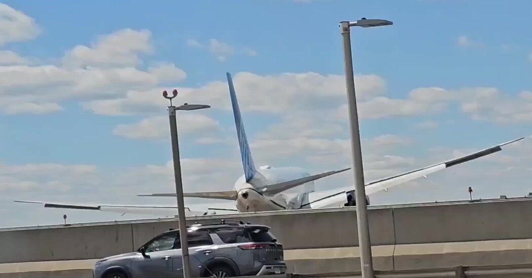 Tractor-Trailer and Light Post Damaged as Plane Lands at Newark Airport