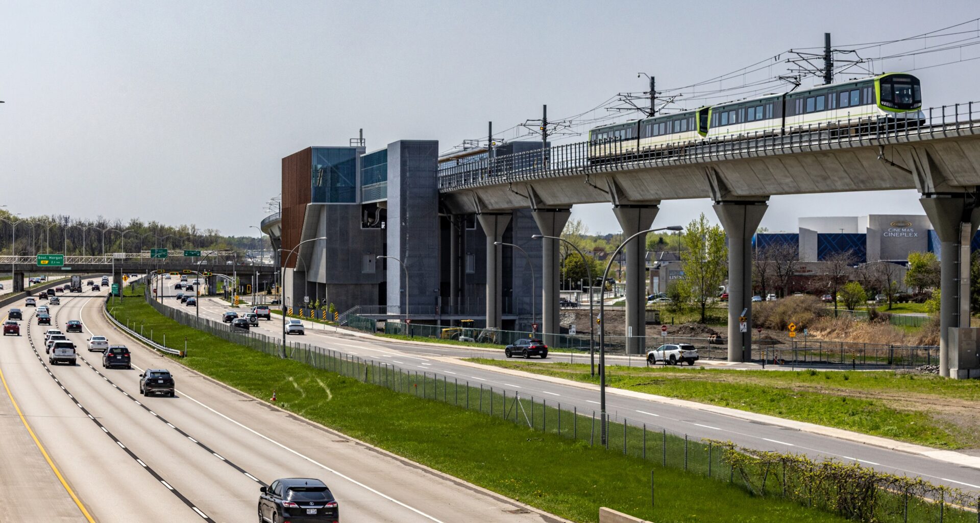 A REM train departs the Kirkland station on the new Anse-à-l