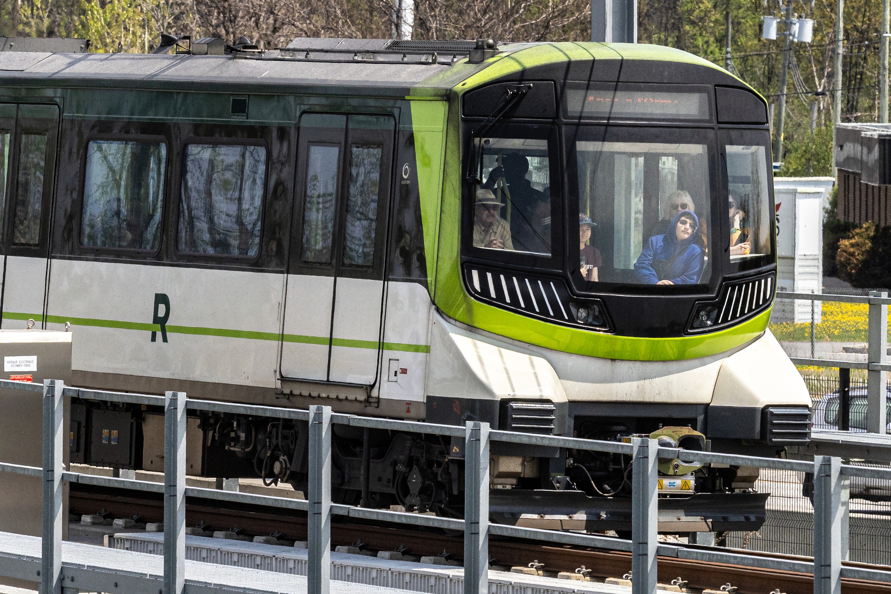 A REM train pulls into the Anse-à-l'Orme station in Ste-Anne-de-Bellevue on Monday.