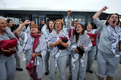 Activists from the Global Sumud Flotilla chant slogans upon their arrival at Istanbul Airport, in Istanbul, Turkey, Thursday. Credit: Emrah Gurel/AP Activists from the Global Sumud Flotilla chant slogans upon their arrival at Istanbul Airport, in Istanbul, Turkey, Thursday.