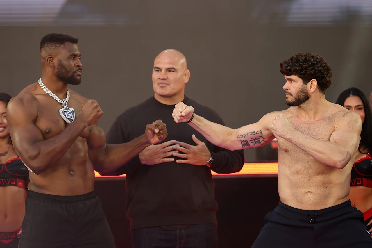INGLEWOOD, CALIFORNIA - MAY 15: Francis Ngannou faces off against Philipe Lins during the Weigh-In for Netflix's Ronda Rousey vs. Gina Carano at Intuit Dome on May 15, 2026 in Inglewood, California. (Photo by Sarah Stier/Getty Images for Netflix)