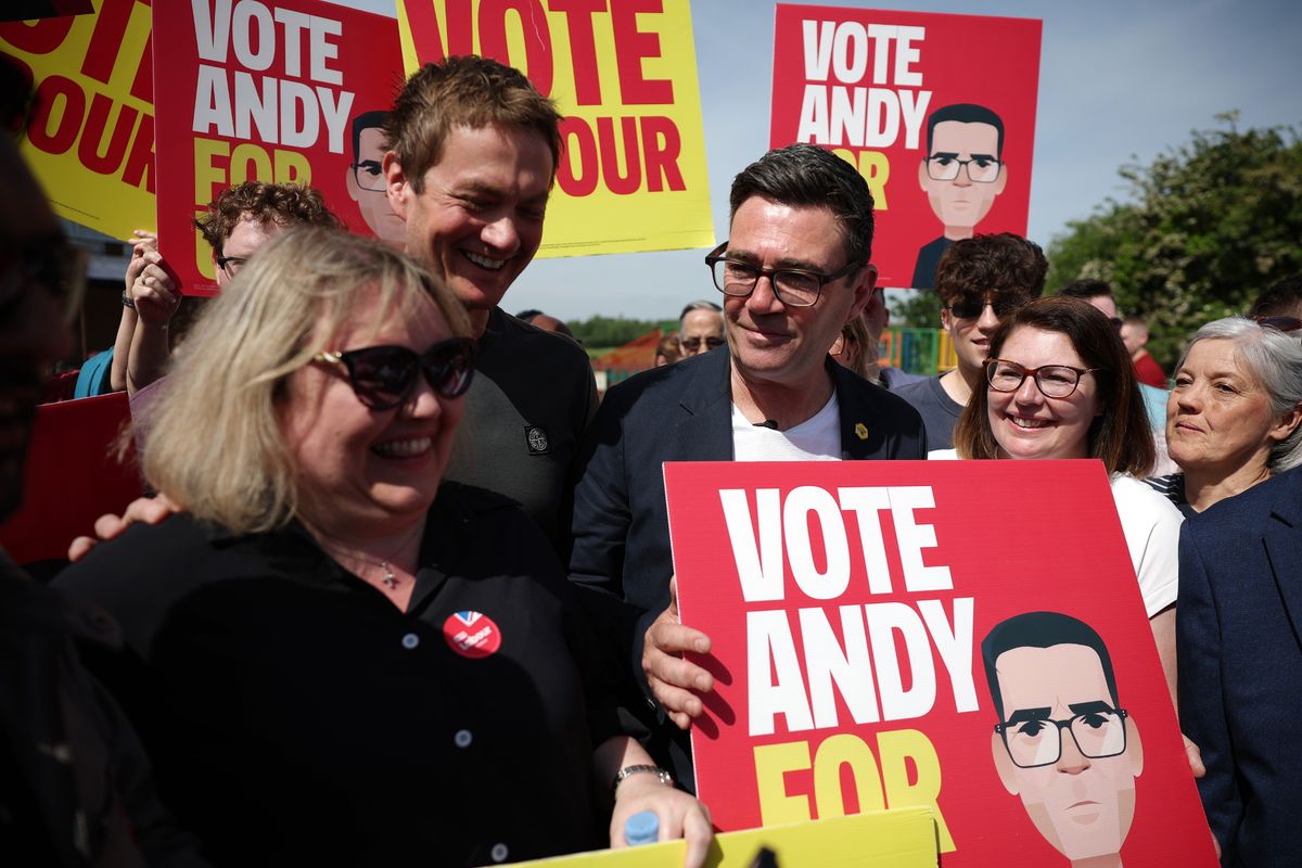 Labour Party candidate Andy Burnham meets supporters during his campaign launch for the Makerfield By-election
