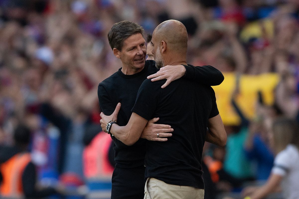 LONDON, ENGLAND - MAY 17: Crystal Palace manager Oliver Glasner embraces Manchester City manager Pep Guardiola after the Emirates FA Cup Final match between Crystal Palace and Manchester City at Wembley Stadium on May 17, 2025 in London, England. (Photo by Visionhaus/Getty Images)