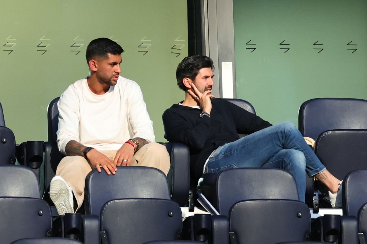 Cristian Romero's agent Ciro Palermo (right) has spoken about the uproar surrounding the Tottenham Hotspur captain