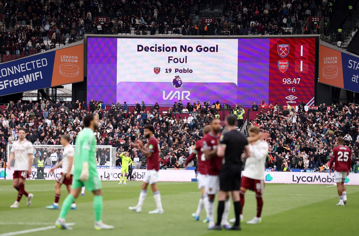 The LED board displays the VAR decision that disallowed the goal scored by Callum Wilson of West Ham United, after Pablo of West Ham United fouled David Raya of Arsenal during the Premier League match between West Ham United and Arsenal at London Stadium on May 10, 2026 in London, England