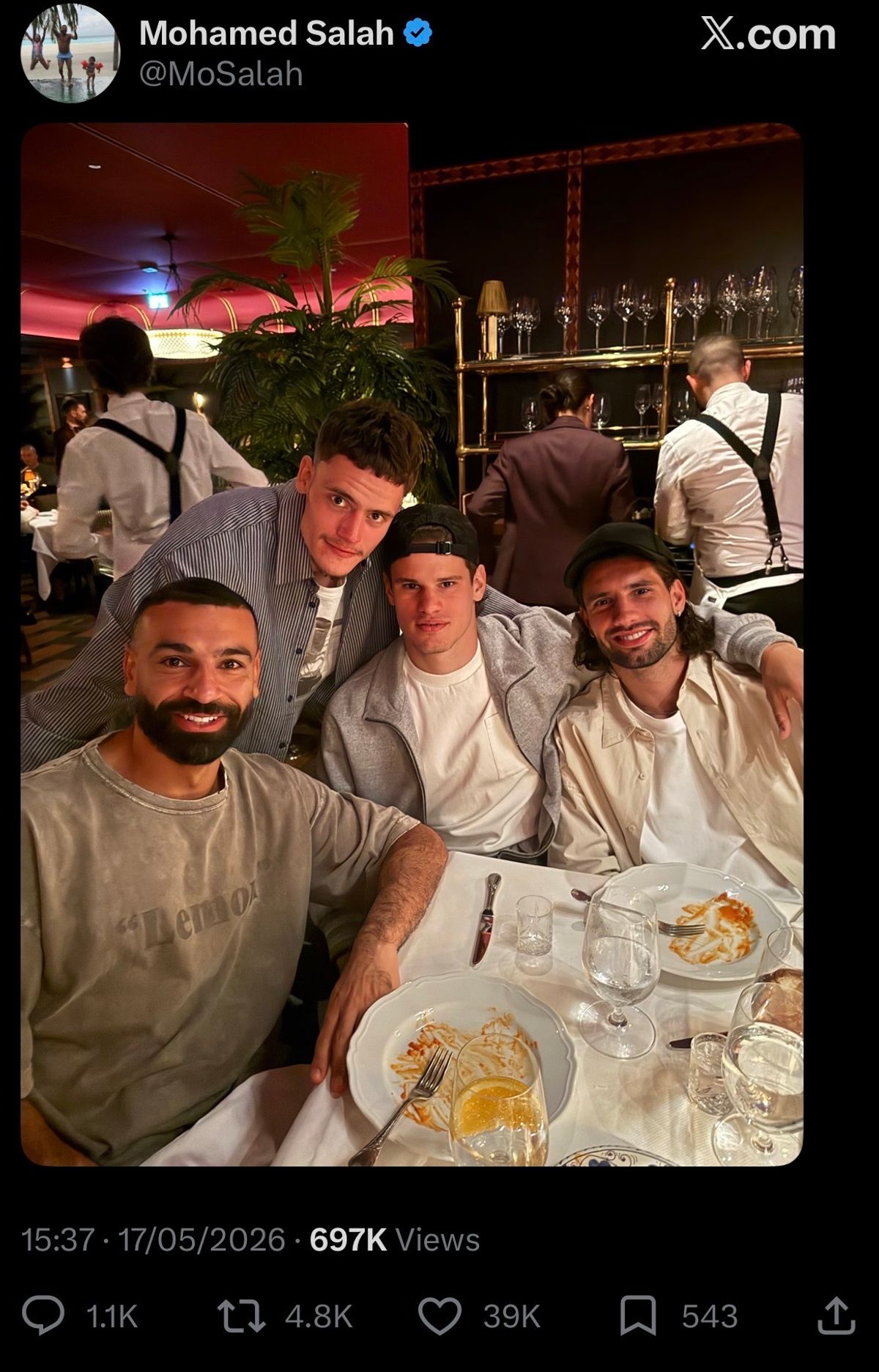 Mohamed Salah with three Liverpool teammates at a restaurant