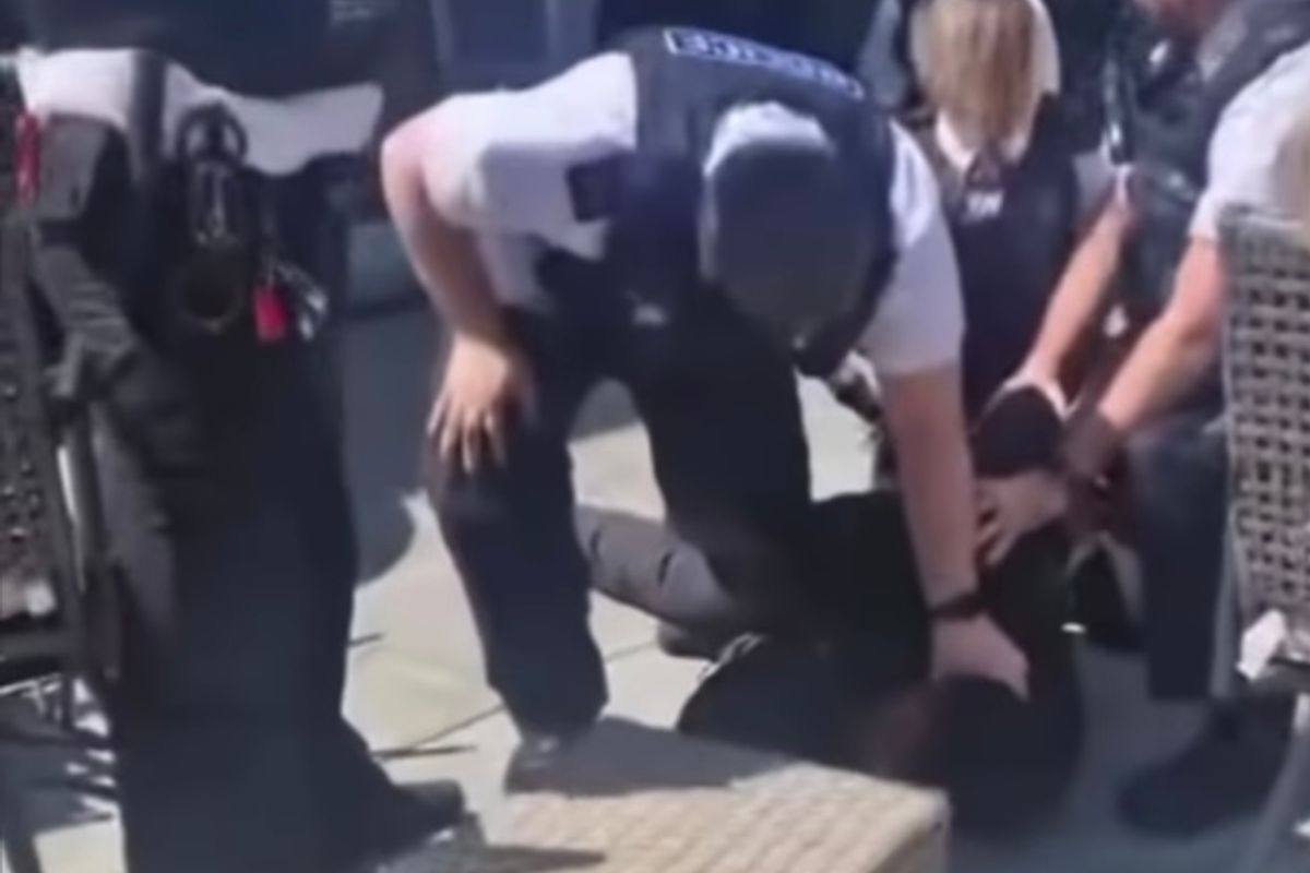 Merseyside Police officers detain man following incident on Gilbert Street