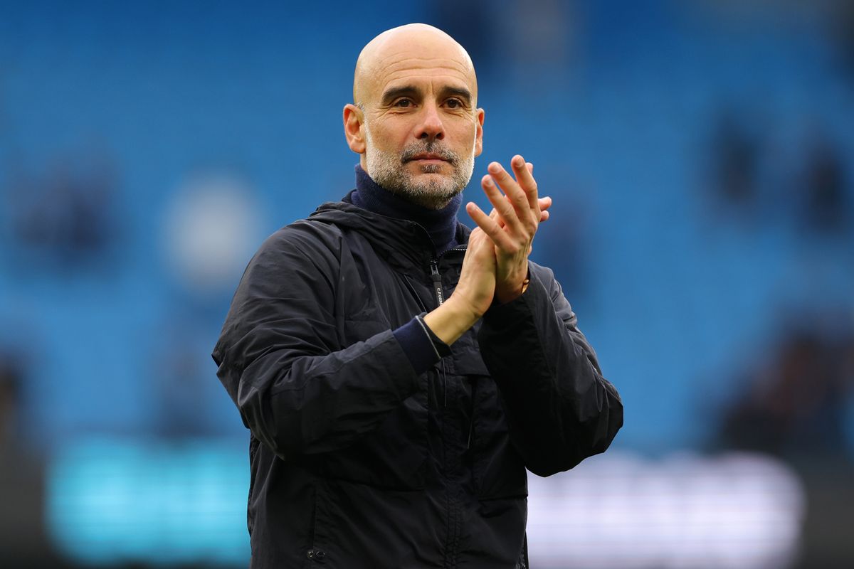 Pep Guardiola applauds
