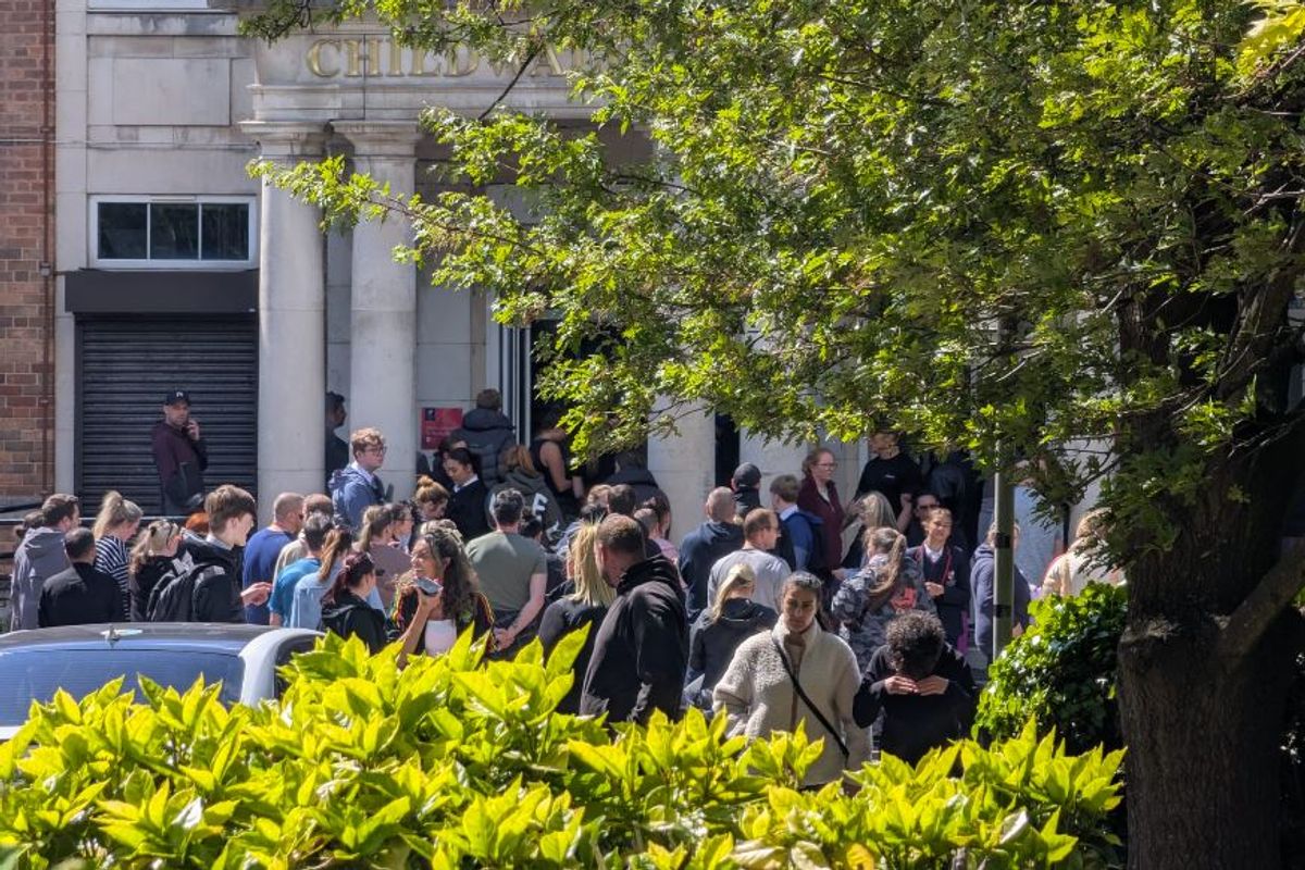 Parents outside Childwall Sports and Science Academy