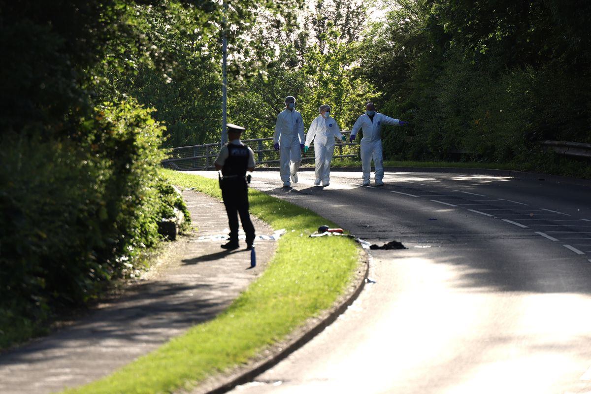 Forensic officers focusing their enquiries on the M57 flyover bridge on Pottery Lane
