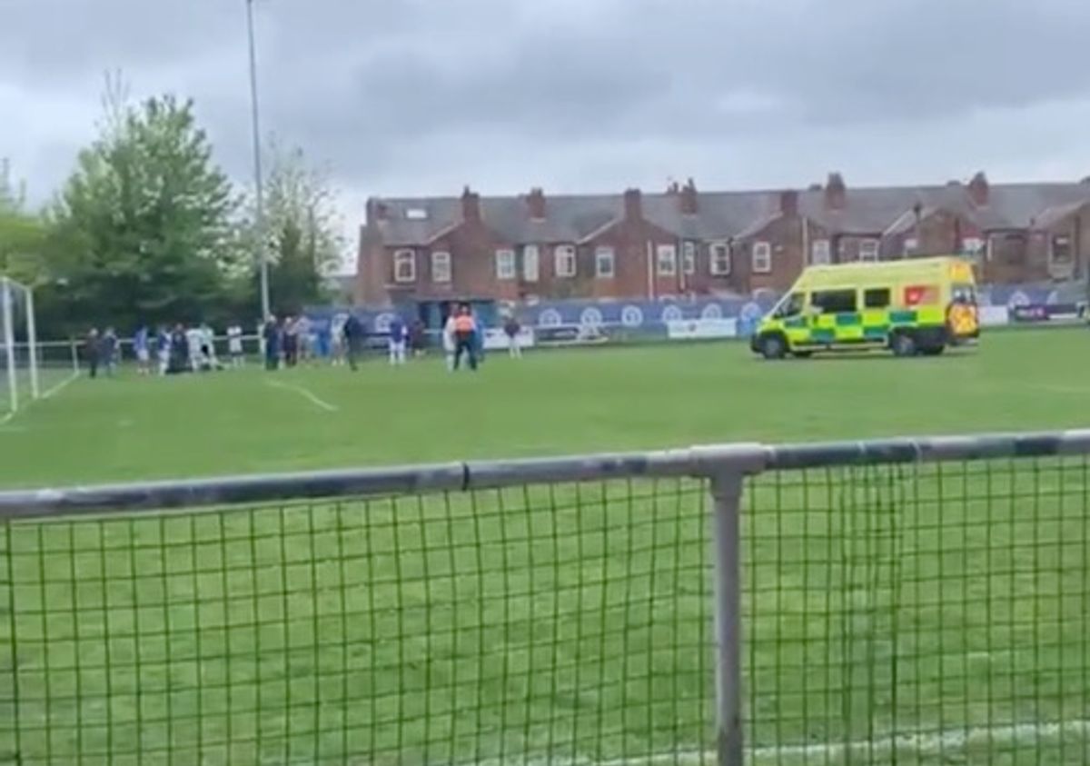 Ambulance on football pitch after Stephen Ireland injury.