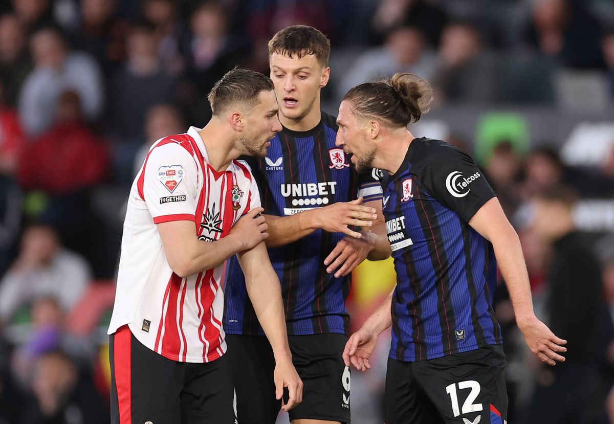 Taylor Harwood-Bellis of Southampton clashes with Luke Ayling of Middlesbrough