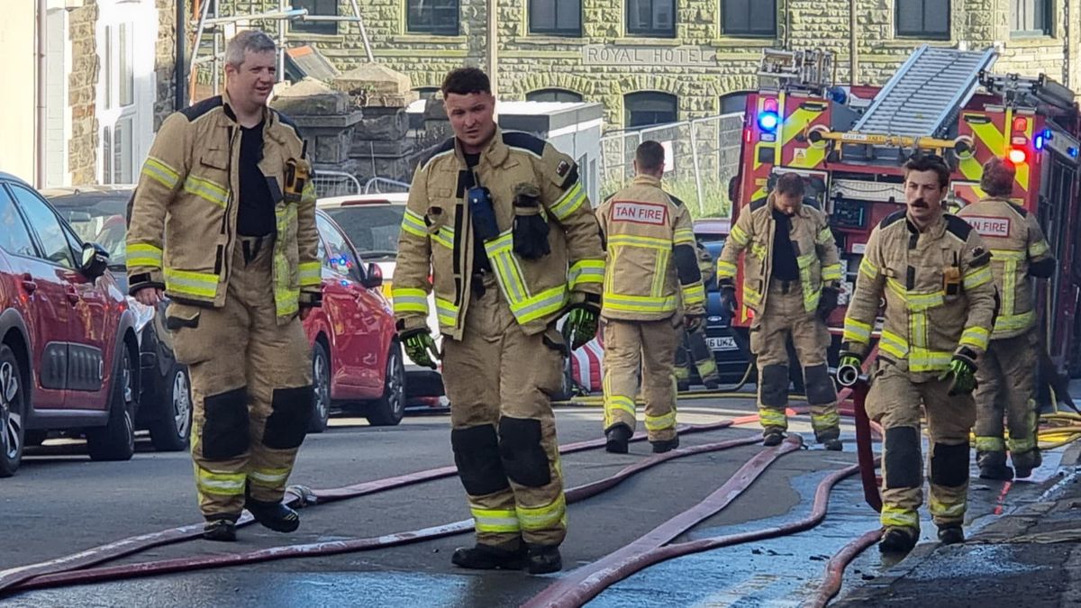 Fire officers working at Thomas Street on Sunday evening as residents told they can't return to their homes for hours