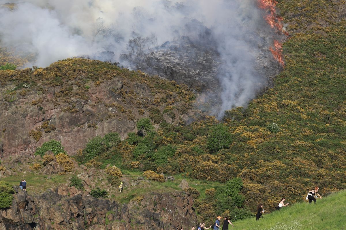 Onlookers stopped to take in the blaze