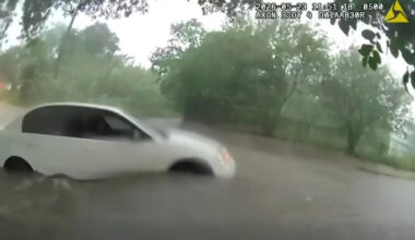 Video shows infant being rescued from car trapped in Texas floodwaters