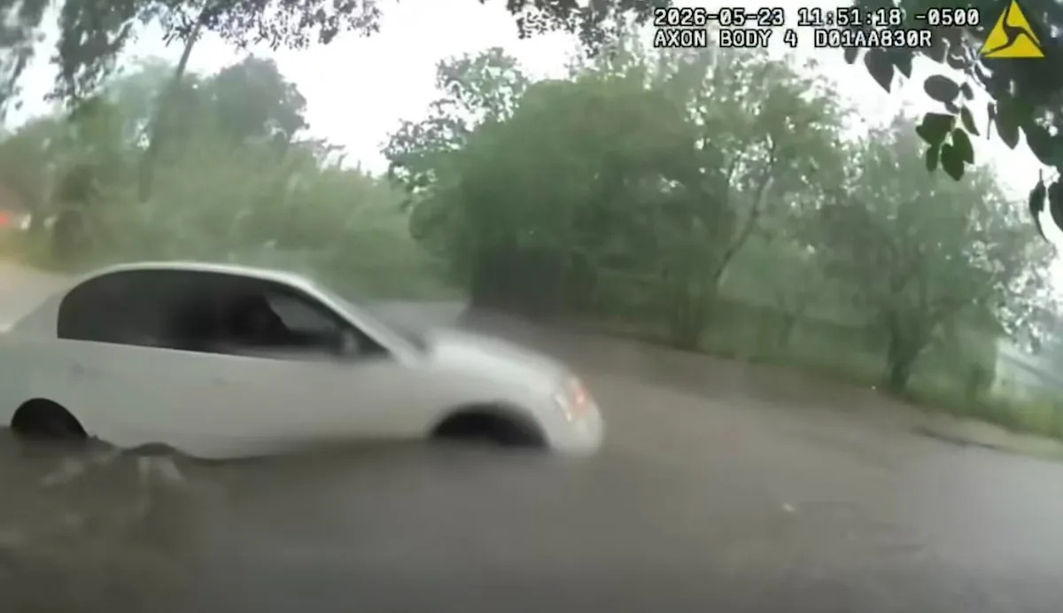 Video shows infant being rescued from car trapped in Texas floodwaters