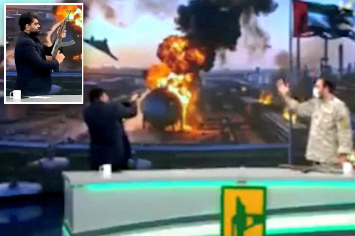 Moment Iranian TV news anchor fires assault rifle on live television