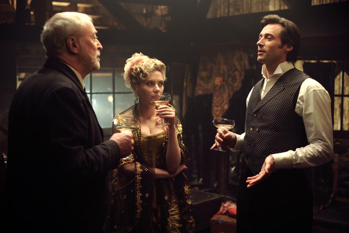 Michael Caine, from left, Scarlett Johansson and Hugh Jackman in the "The Prestige," screening Saturday at the Aero.