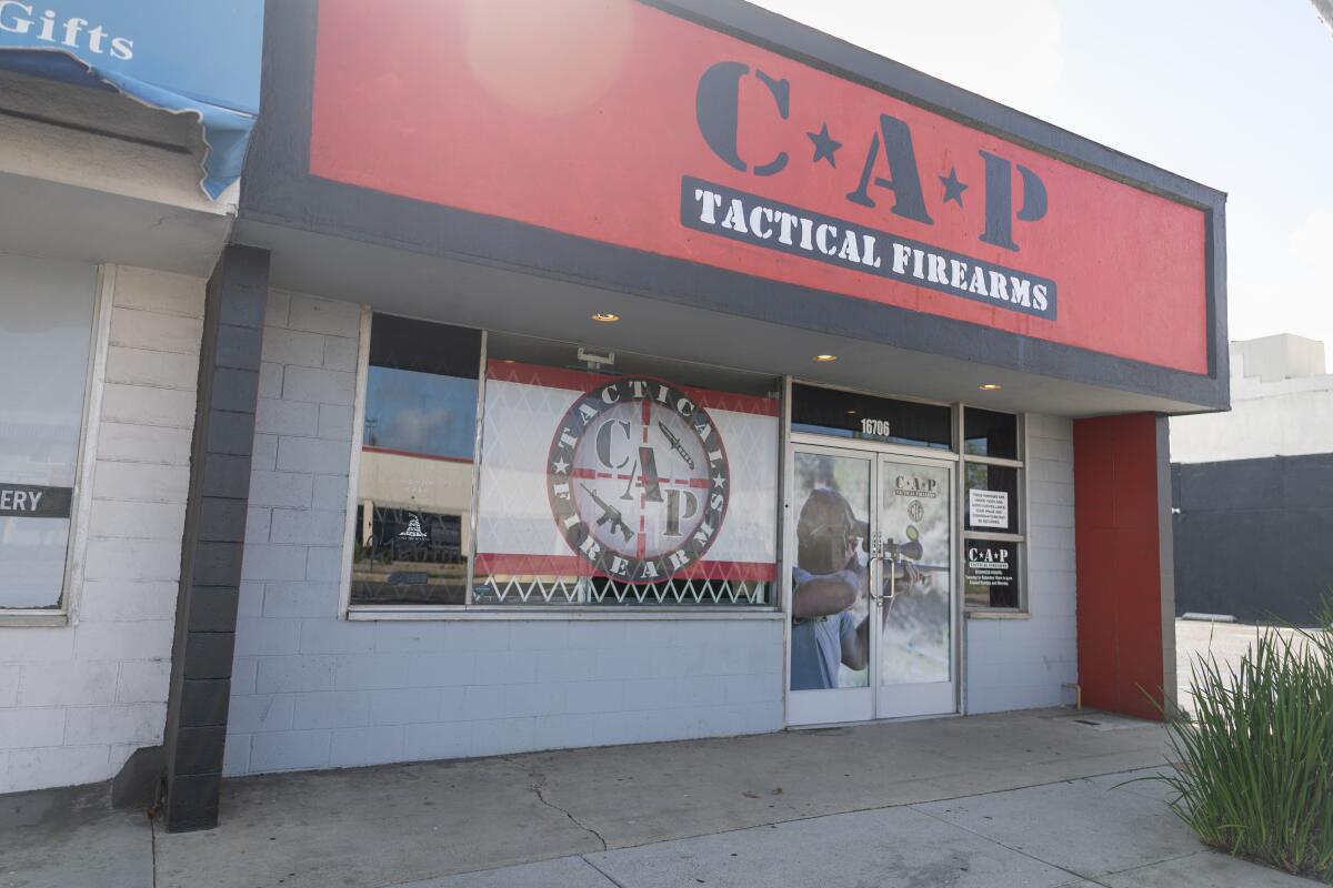 The exterior of a gun store.