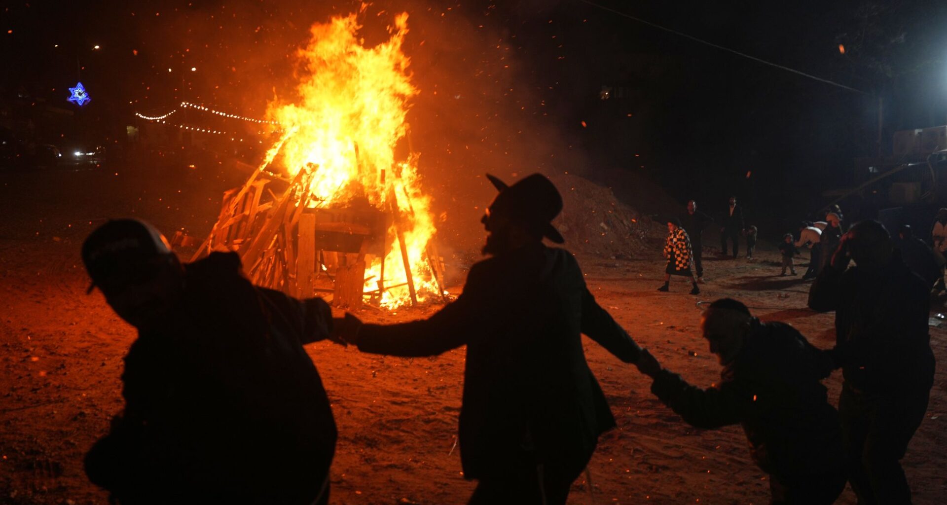 Jewish holiday Lag BaOmer lights up Israel with bonfires and song, in photos