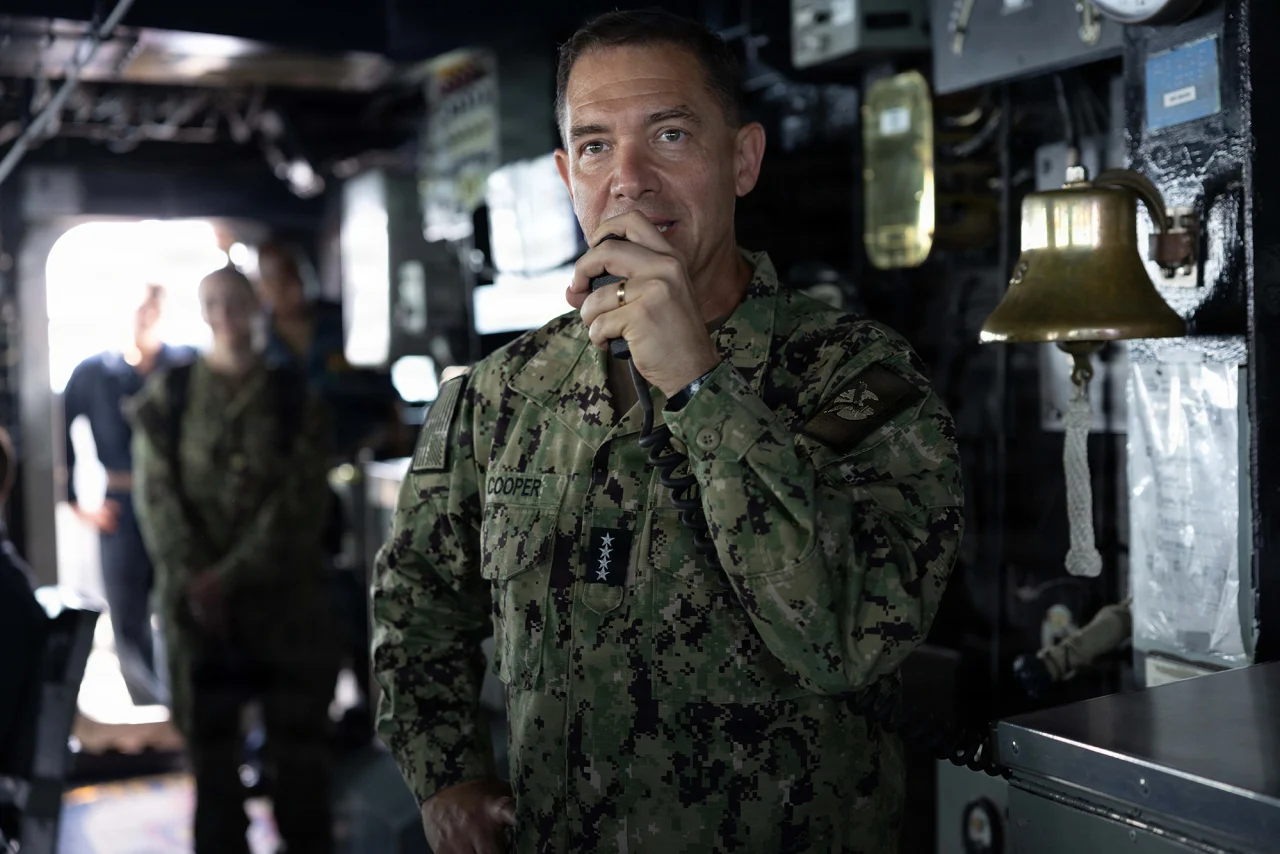 US Navy Admiral Brad Cooper, commander of U.S. Central Command, speaks with the crew on the 1MC during a visit to Arleigh Burke-class guided-missile destroyer USS Milius on May 2.