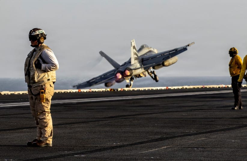 An F/A-18E Super Hornet launches from the flight deck of the US Navy Nimitz-class aircraft carrier USS Abraham Lincoln during the Operation Epic Fury attack on Iran April 1, 2026.