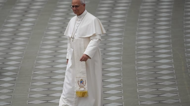 Pope Leo XIV arrives at the swearing in ceremony for...