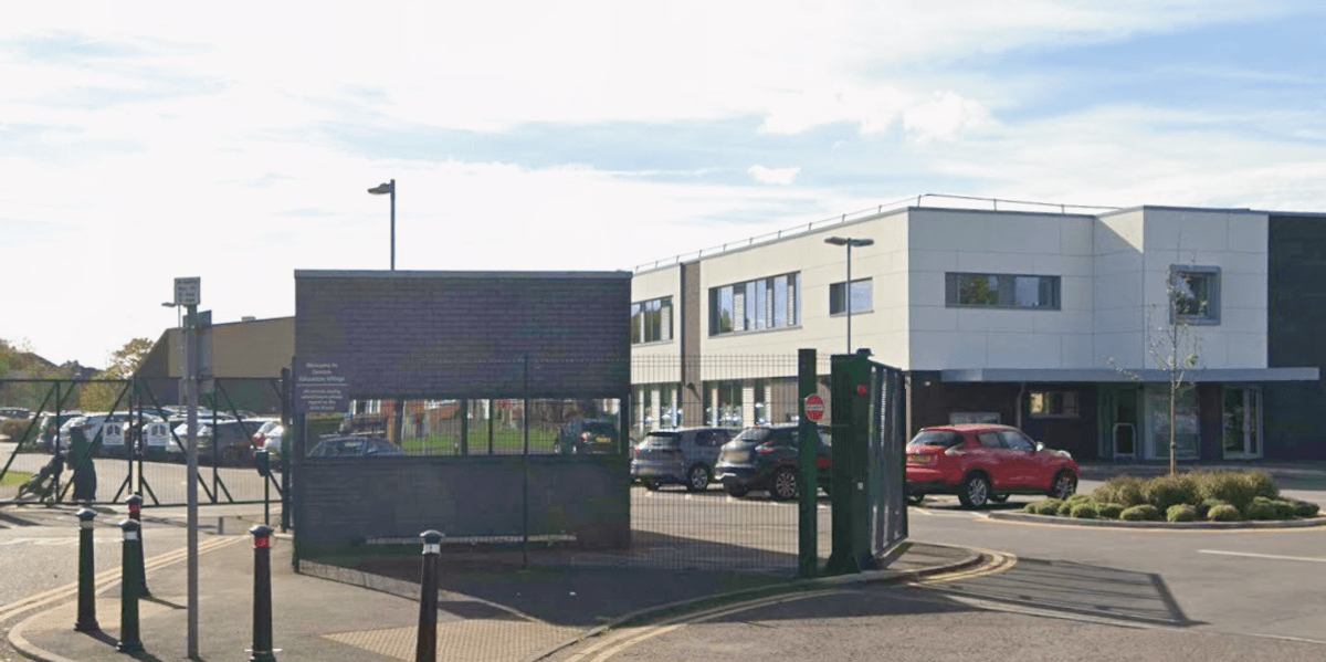 School plunges into lockdown with pupils 'hiding under desks' as police race to scene