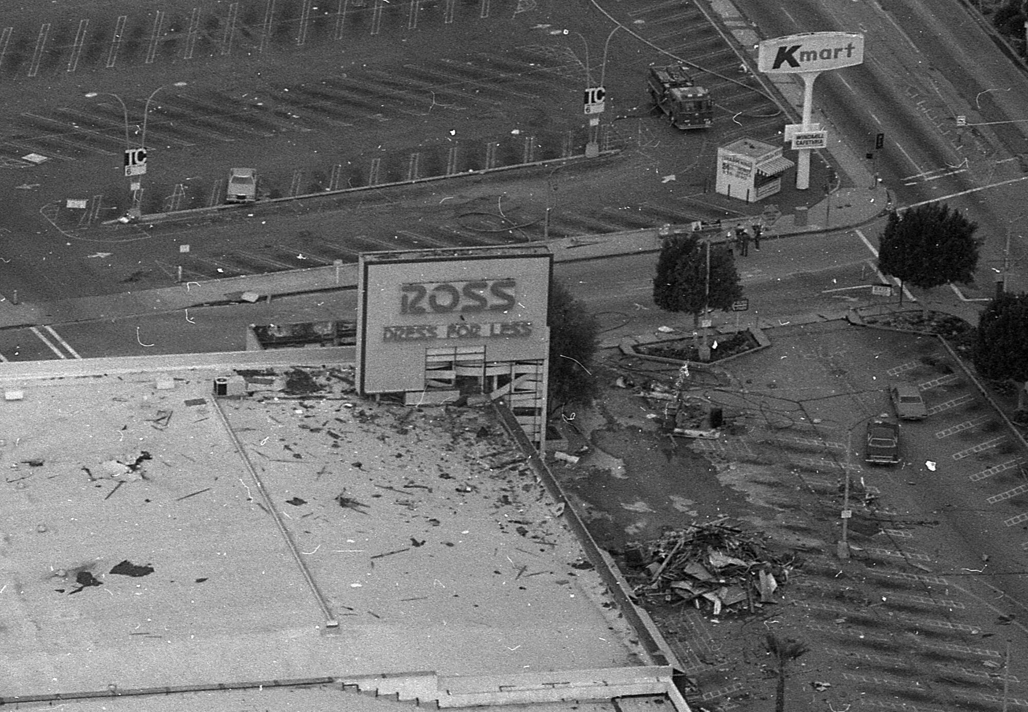 A Ross Dress for Less sign surrounded by debris
