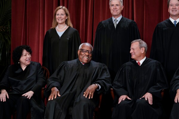 Members of the Supreme Court sit for a new group portrait following the addition of Associate Justice Ketanji Brown Jackson, at the Supreme Court building in Washington, Oct. 7, 2022. Bottom row, from left, Associate Justice Sonia Sotomayor, Associate Justice Clarence Thomas, and Chief Justice of the United States John Roberts. Top row, from left, Associate Justice Amy Coney Barrett, Associate Justice Neil Gorsuch, and Associate Justice Brett Kavanaugh. (AP Photo/J. Scott Applewhite, File)