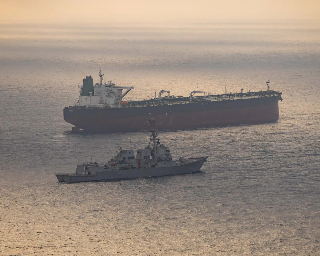 US Central Command released an image of the guided-missile destroyer USS Rafael Peralta and an Iranian-flagged ship attempting to sail to a port in Iran, on Friday, April 24.