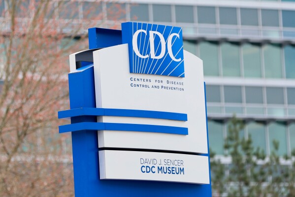A sign with the CDC logo is displayed at the entrance to the agency's headquarters in Atlanta on March 2, 2025. (Miguel Martinez/Atlanta Journal-Constitution via AP, File)