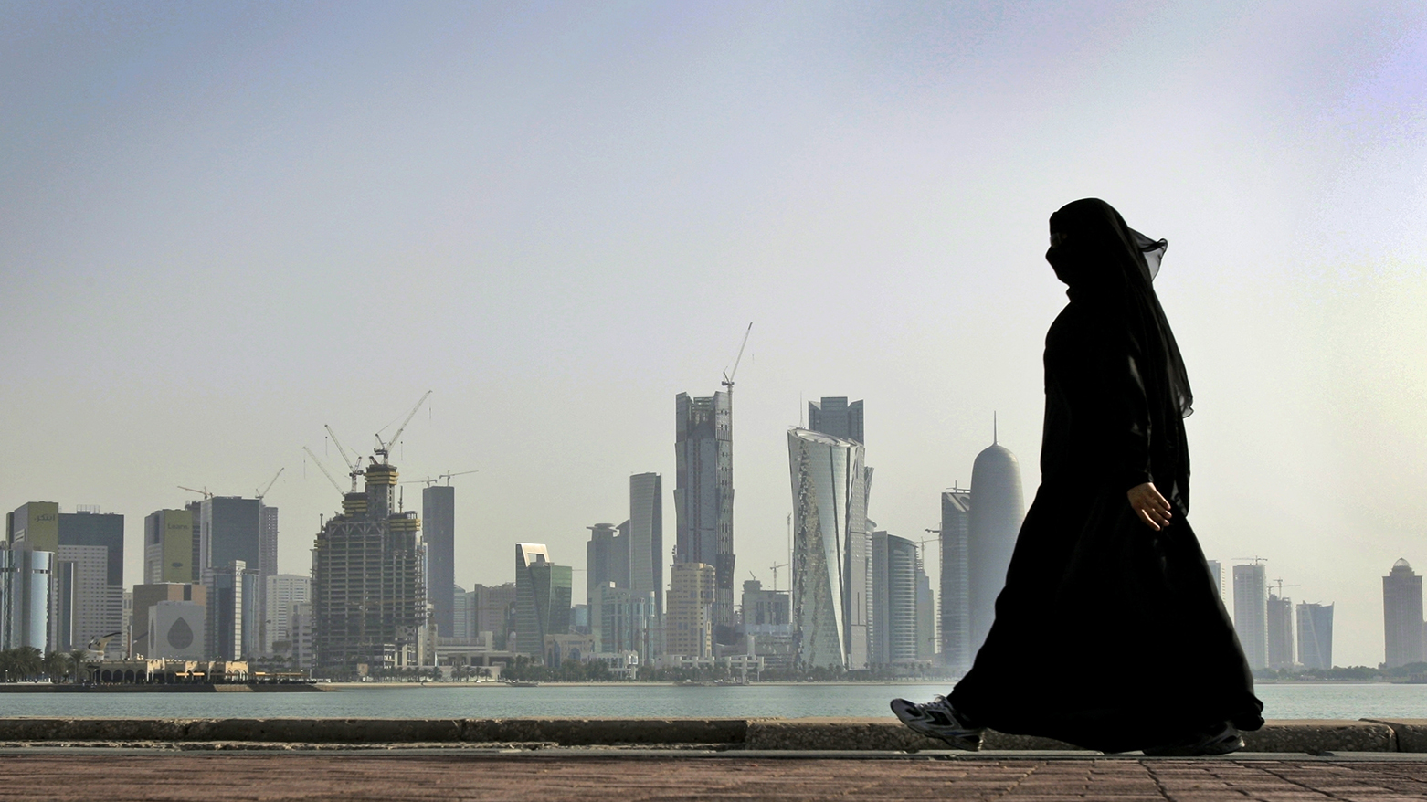 Ship struck near Qatar as Iran warns of retaliation against U.S. bases and ships