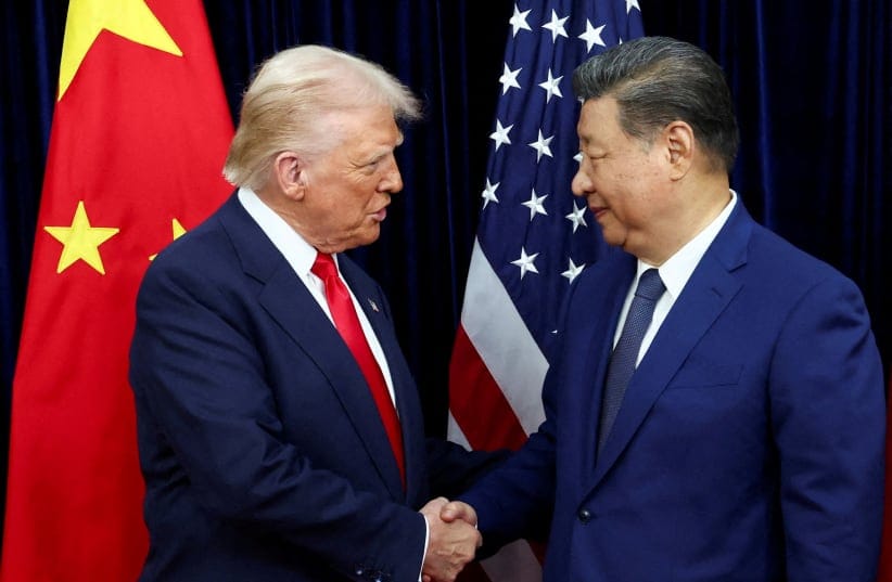 US President Donald Trump shakes hands with Chinese President Xi Jinping as they hold a bilateral meeting at Gimhae International Airport, on the sidelines of the Asia-Pacific Economic Cooperation (APEC) summit, in Busan, South Korea, October 30, 2025.