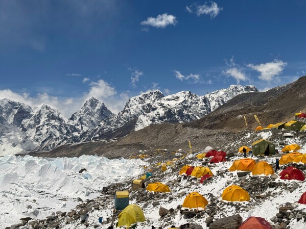 Mountaineers' and guides' tents are spread over at the base camp of Mount Everest, Nepal, Sunday, May 10, 2026. (AP Photo/Pasang Rinzee Sherpa)
