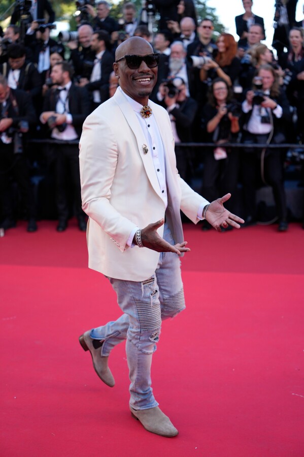 Tyrese Gibson poses for photographers at the opening ceremony and premiere of the film 'The Electric Kiss' during 79th international film festival, Cannes, southern France, Tuesday, May 12, 2026. (AP Photo/John Locher)