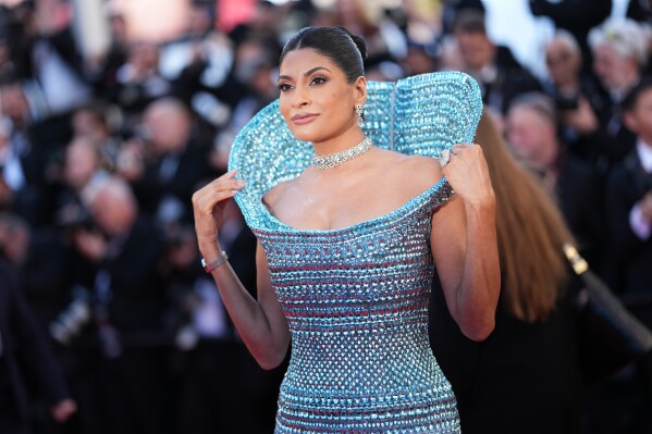 Farhana Bodi poses for photographers at the opening ceremony and premiere of the film 'The Electric Kiss' during 79th international film festival, Cannes, southern France, Tuesday, May 12, 2026. (Photo by Scott A Garfitt/Invision/AP)