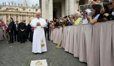 Pope Leo XIV prays at the spot where St. John Paul II was shot