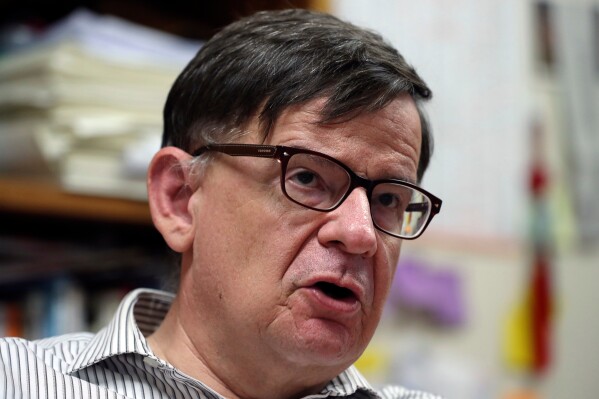 In this Sept. 20, 2017, photo, Andrei Lankov, a North Korea expert at Kookmin University answers a reporter's question during an interview in Seoul, South Korea. (AP Photo/Lee Jin-man, File)