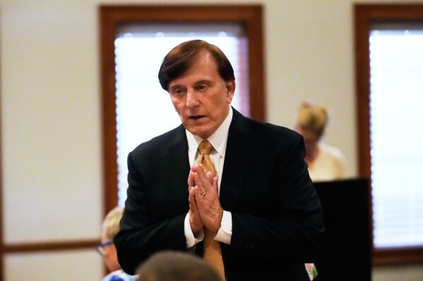 U.S. Senate candidate, current Louisiana treasurer and former U.S. Representative (R-La.) John Fleming, speaks at a Ronald Reagan Newsmaker Luncheon in Baton Rouge, La., Tuesday, May 12, 2026. (AP Photo/Gerald Herbert)