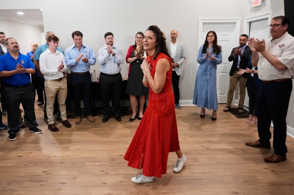 U.S. Senate candidate Julia Letlow greets supporters at a campaign stop at Hammond Northshore Regional Airport in Hammond, La., Wednesday, May 6, 2026. (AP Photo/Gerald Herbert)