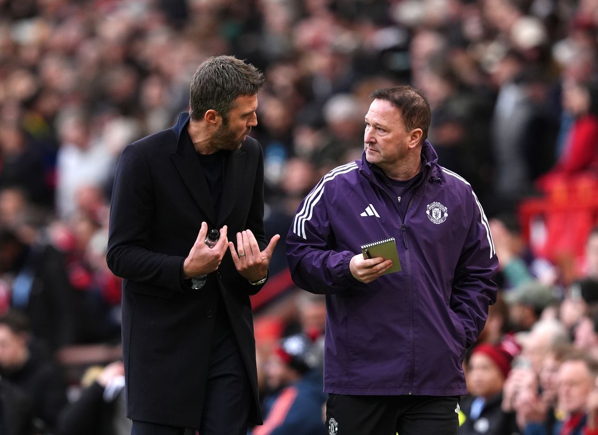Steve Holland (right) and Michael Carrick