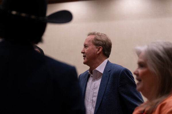 Texas Attorney General, Ken Paxton speaks with attendees during a meet-and-greet for his U.S. Senate candidacy at the Conservative Political Action Conference (CPAC) in Dallas, March 28, 2026. (AP Photo/Gabriela Passos, File)