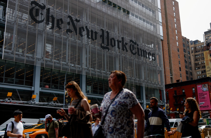 People walk by The New York Times building in Manhattan, New York City, US, September 16, 2025.