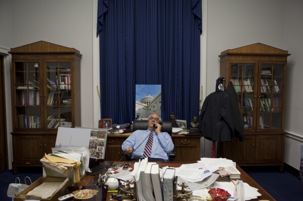 FILE - Rep. Barney Frank, D-Mass., talks on the phone in his office on Capitol Hill in Washington, Oct. 9, 2009, before an interview with The Associated Press. (AP Photo/Evan Vucci, File)