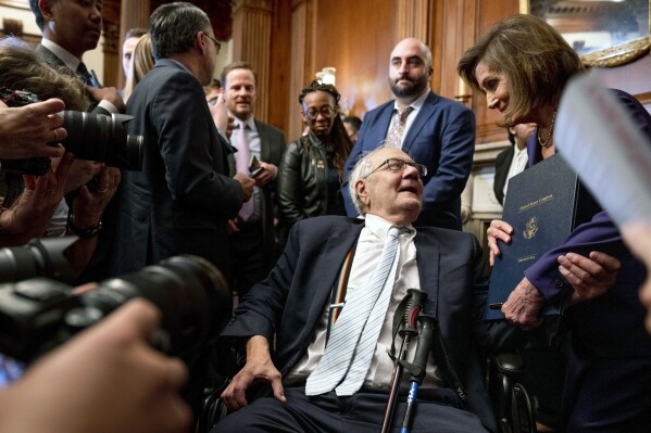 House Speaker Nancy Pelosi of Calif., speaks with former Rep. Barney Frank, D-Mass., after signing H.R. 8404, the Respect For Marriage Act, on Capitol Hill in Washington, Dec. 8, 2022. (AP Photo/Andrew Harnik, File)
