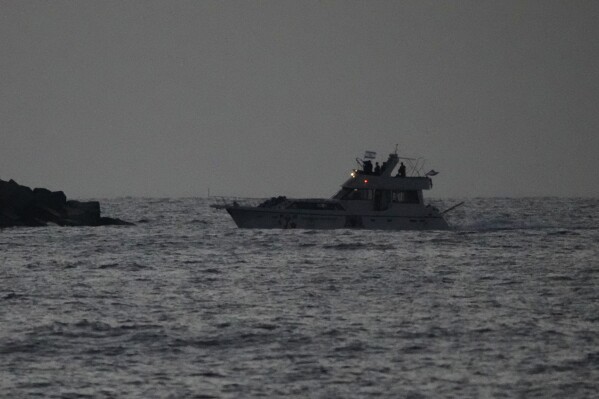 Israeli naval forces sail a confiscated Gaza-bound flotilla boat into Israel's Ashdod port after intercepting the vessel on the Mediterranean Sea, Tuesday, May 19, 2026. (AP Photo/Ariel Schalit)