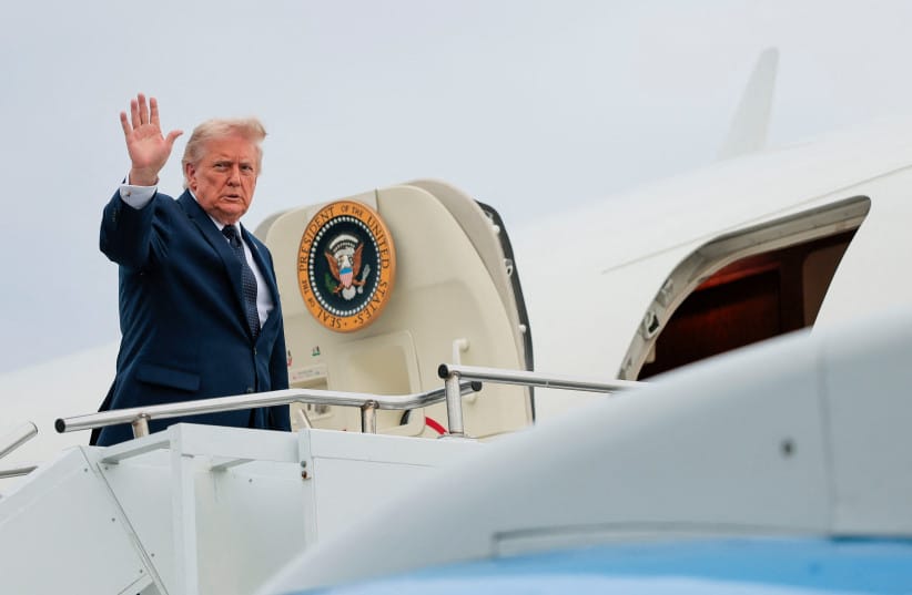 US President Donald Trump boards Air Force One en route to Joint Base Andrews, Maryland, as he departs Morristown Airport in Morristown, New Jersey, May 22, 2026.