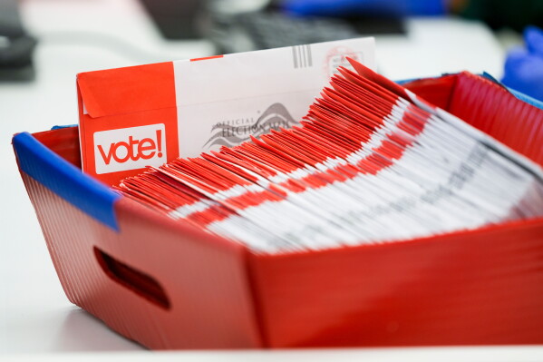 A tray of mail-in ballots is seen at King County Elections headquarters on Election Day, Nov. 5, 2024, in Renton, Wash. (AP Photo/Lindsey Wasson, File)